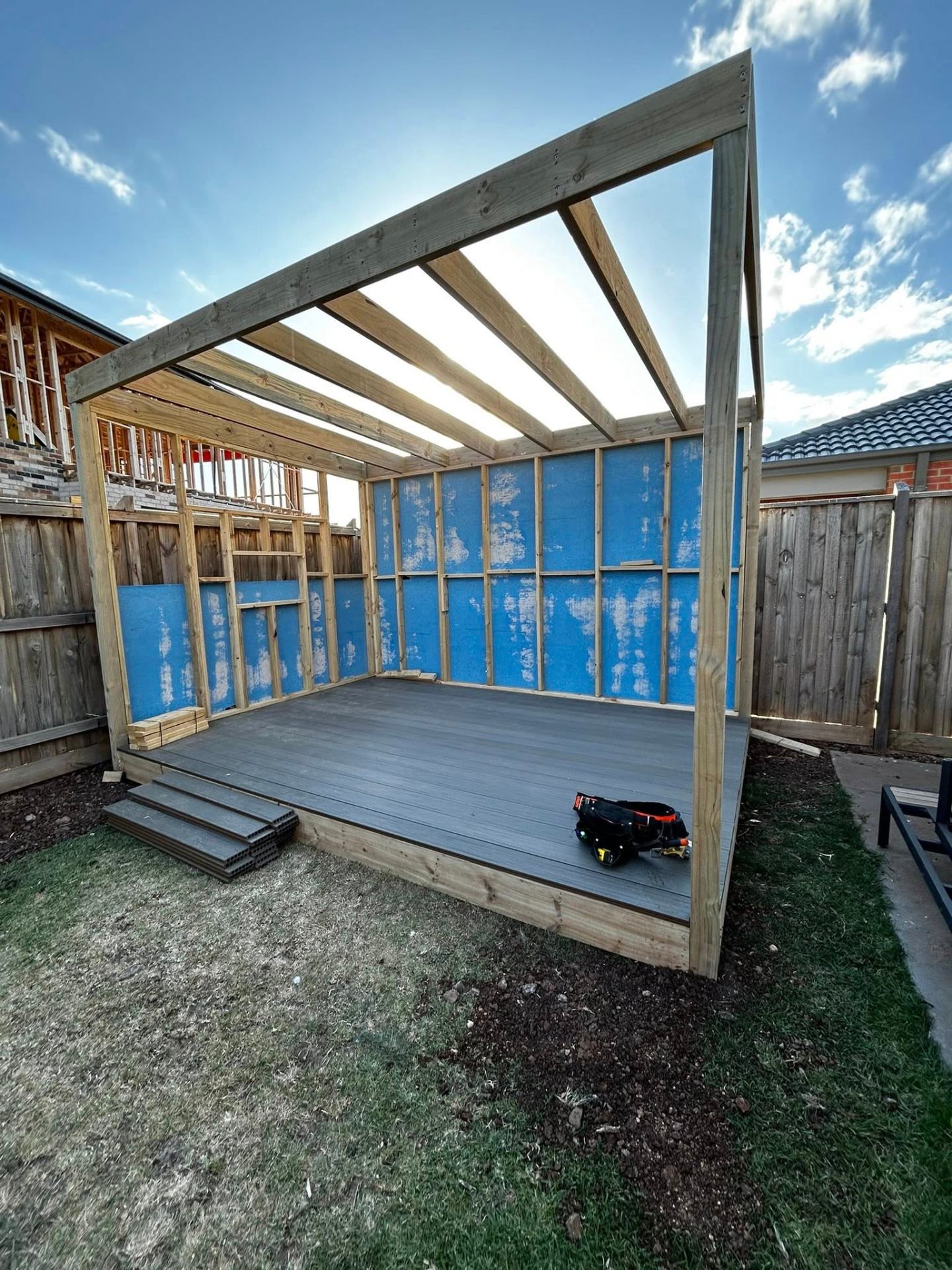 Timber pergola and outdoor room frame under construction in Melbourne's west