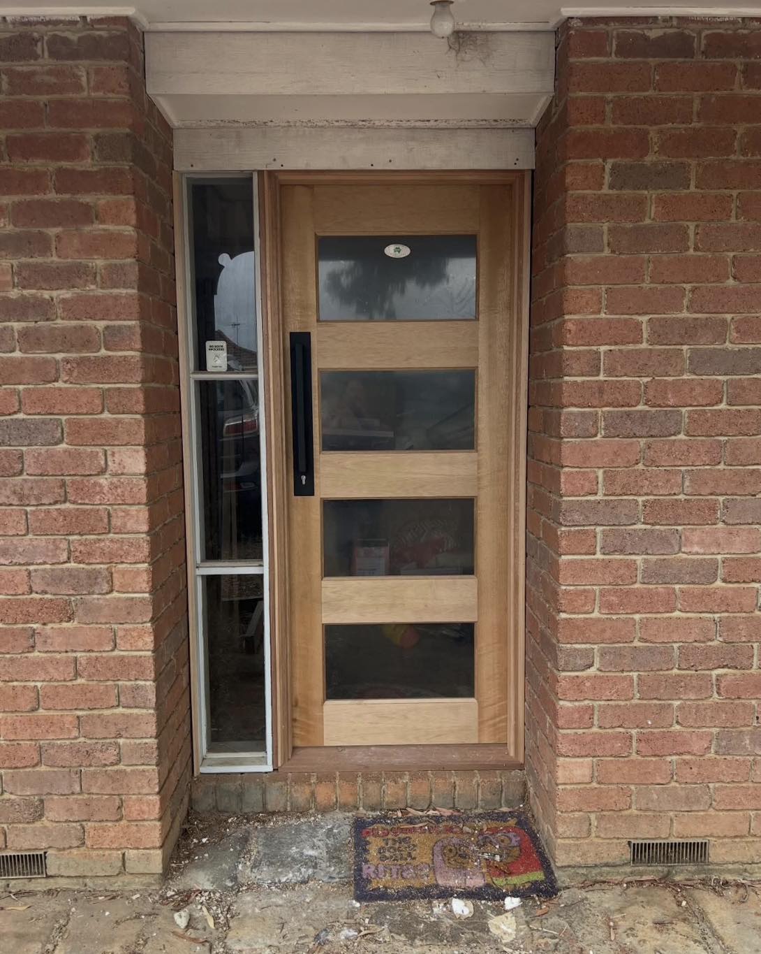 Solid timber four-panel front door installed by B. Rhodes Carpentry